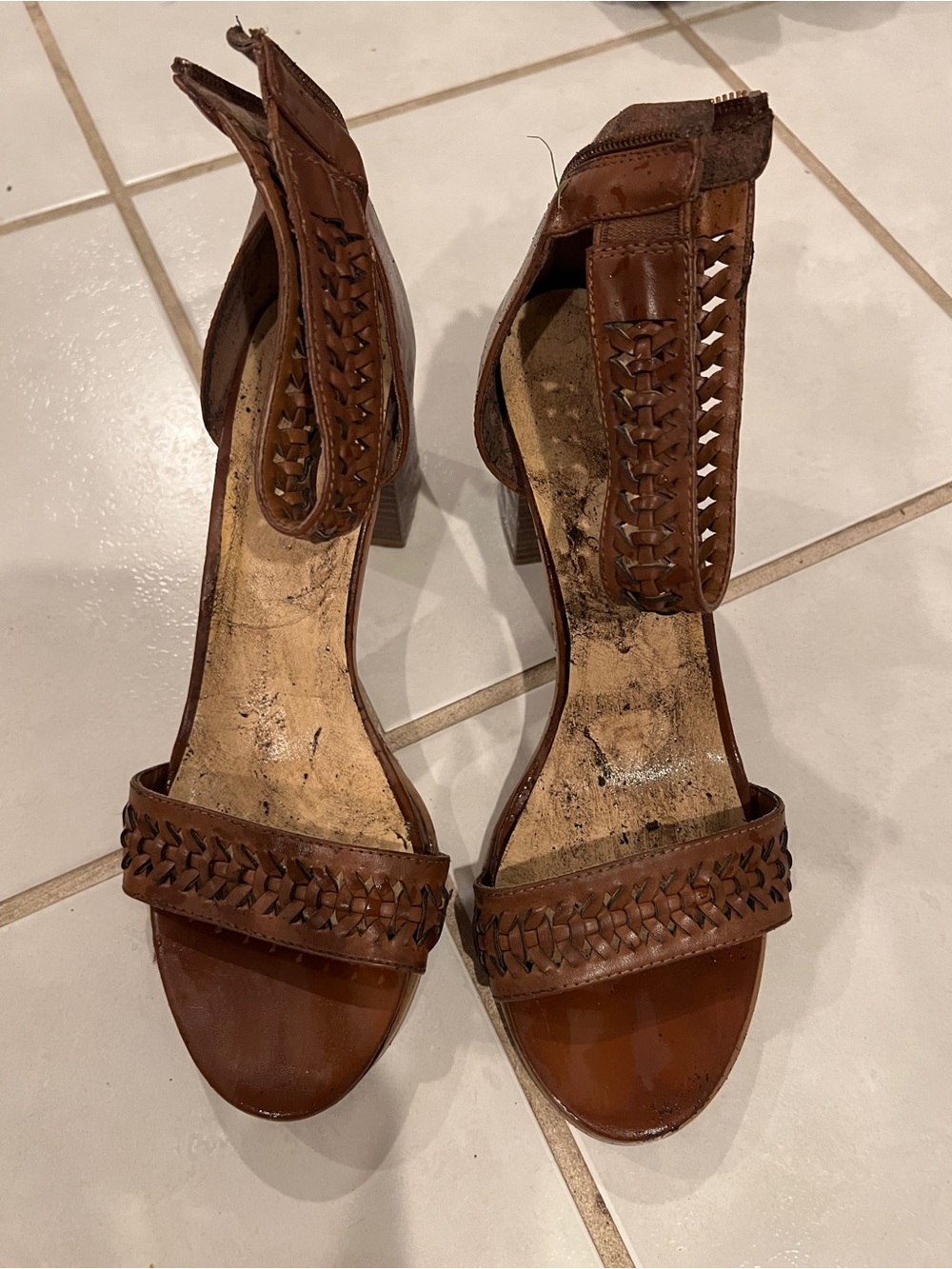 Well worn brown heels highly used